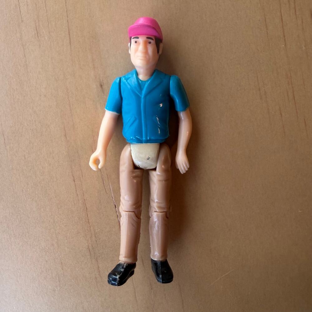Vintage Nylint Action Figure Man with Blue Shirt and Pink Hat 1990's